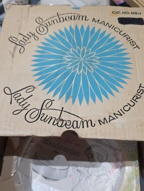Lady Sunbeam Manicurist Box with Blue Floral Graphic